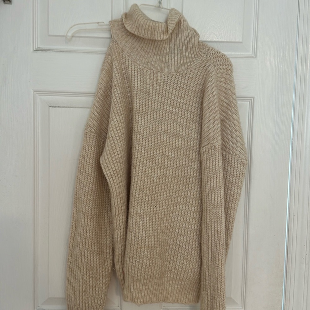 Lightly worn tan turtleneck